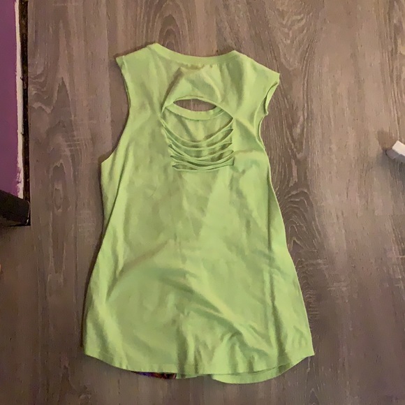 This is a lime green and yellow with a giraffe on it with cute on the back - Picture 2 of 2